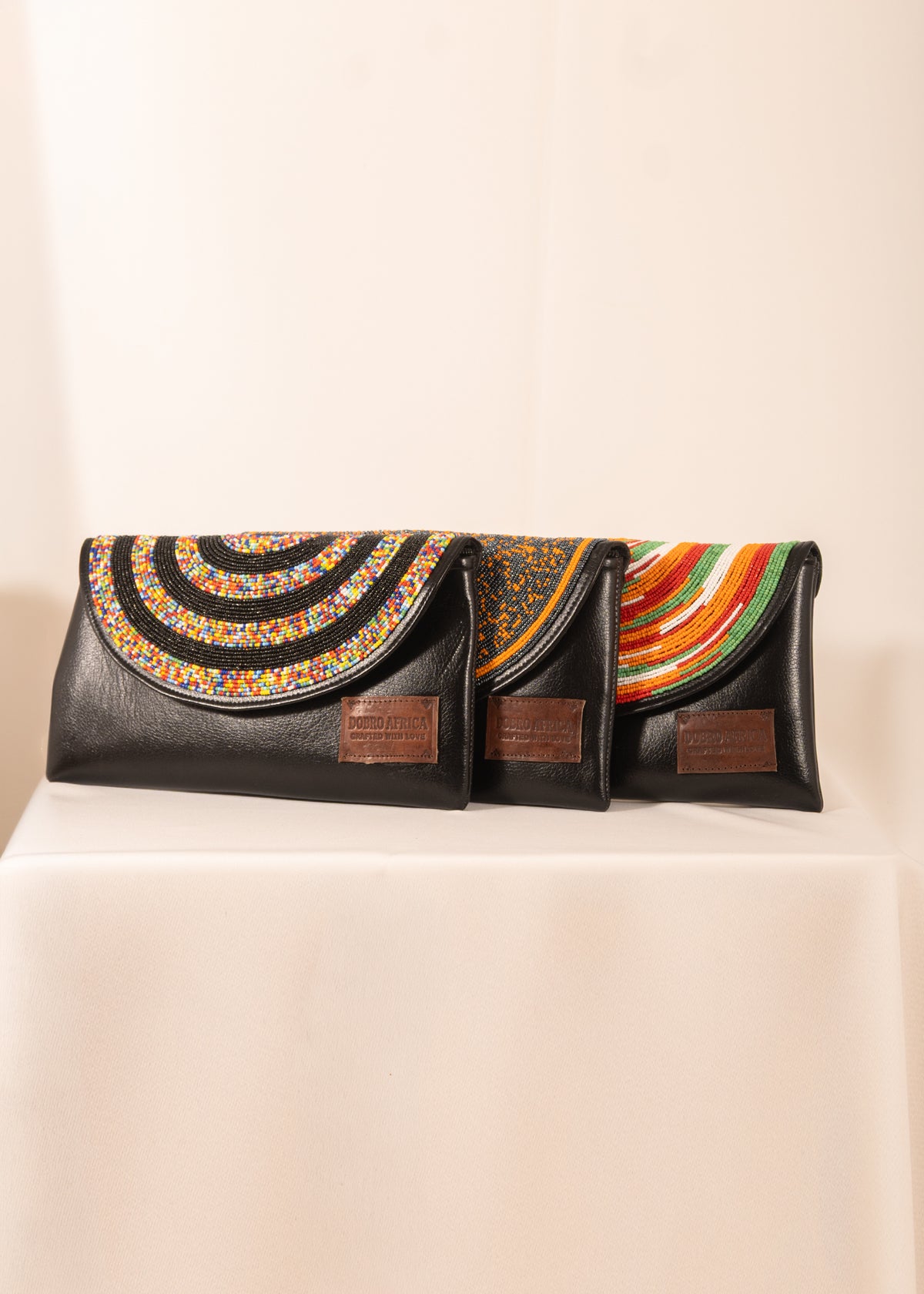 Hand beaded Leather Clutchs